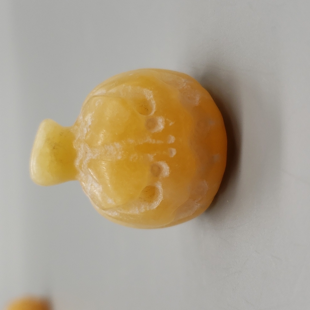 Mini orange calcite jack o lantern